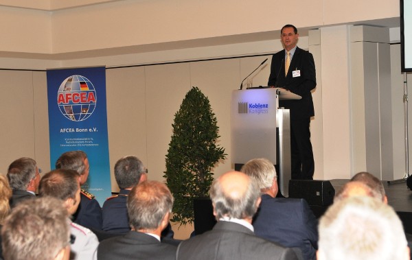 Stéphane Beemelmans, state secretary for the German Ministry of Defense, gives a welcome speech at the August Koblenz IT Convention.